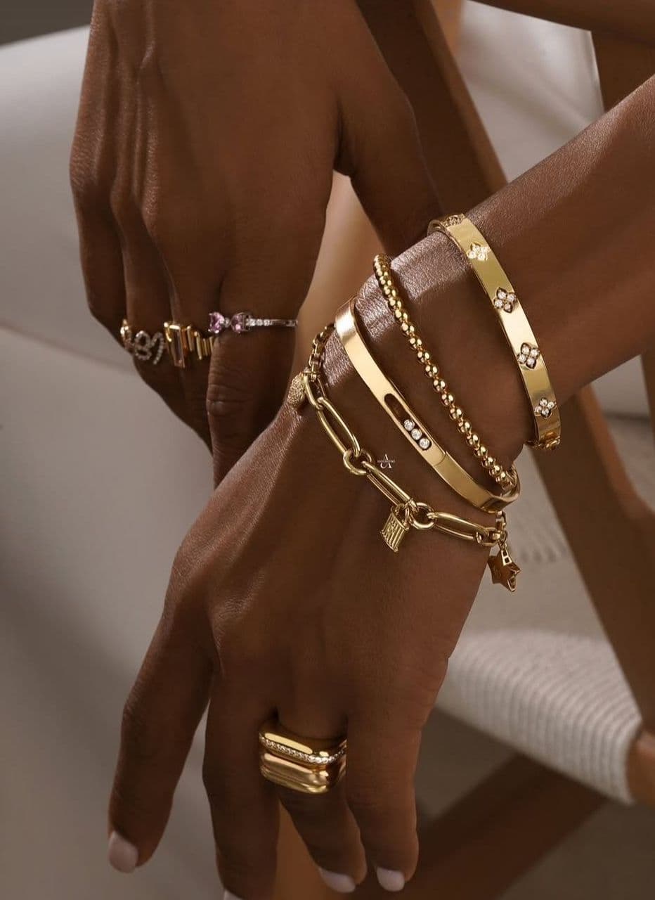 Gold bracelets and rings collection