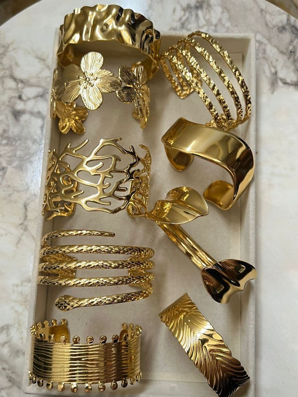 Gold cuff bracelets